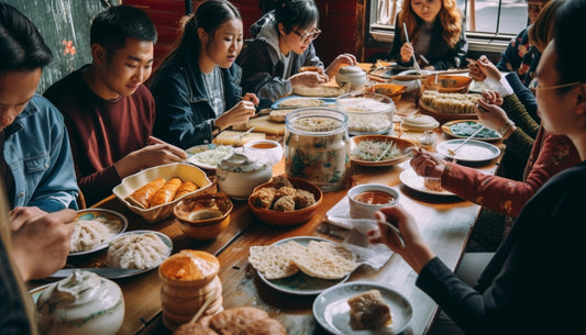 Friends eating together with chopsticks